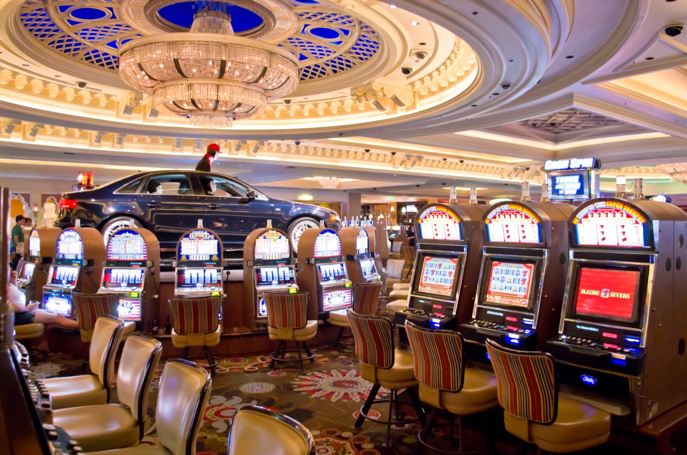 A slot machine floor with paytables visible on screen - RTP, volatility, and house edge are usually one tap away on modern machines, if you know what you're looking at. Photo by Antoine Taveneaux, licensed CC BY-SA 3.0.