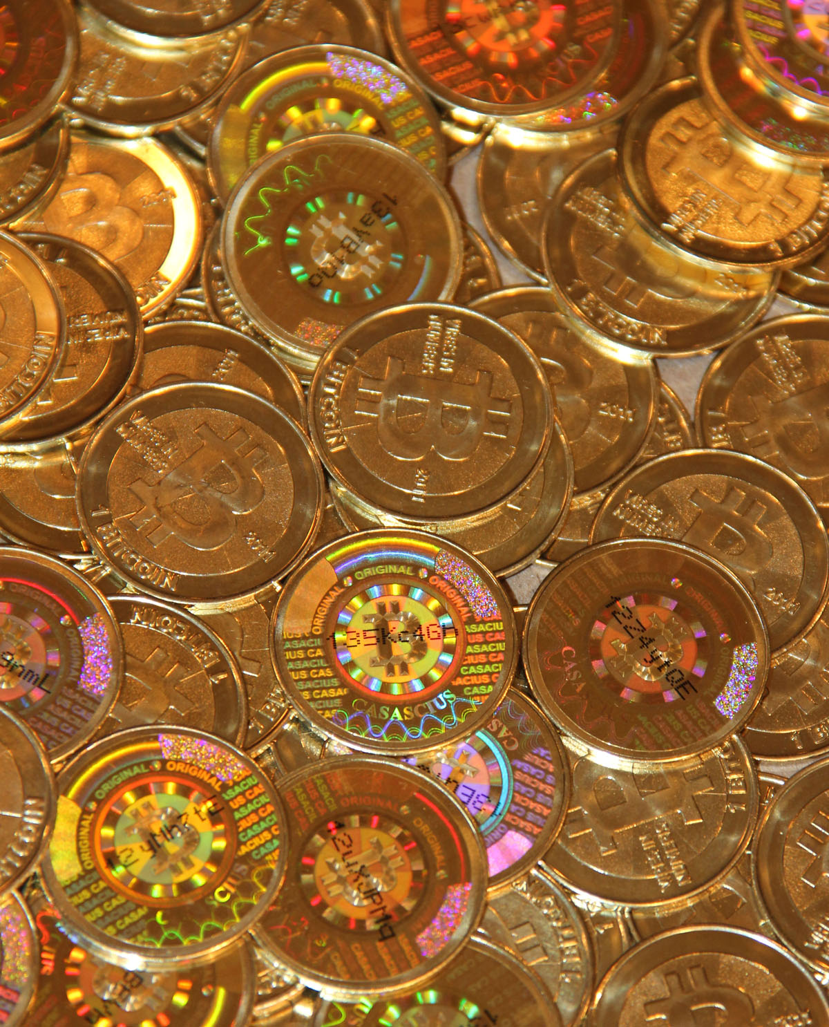 Physical Bitcoin tokens - a visual stand-in for the digital coins crypto casinos actually accept as deposits and withdrawals.